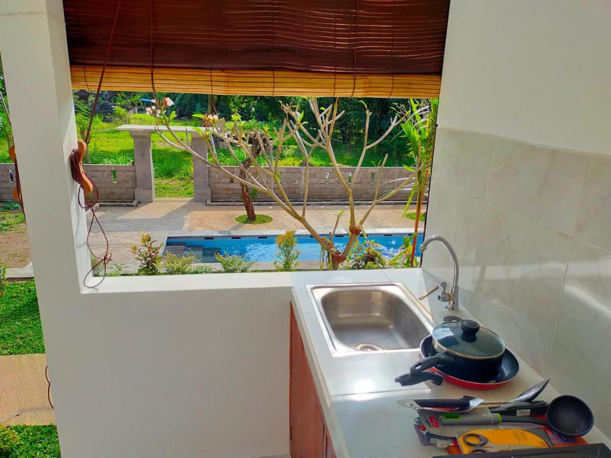 Okaoki Homestay Amed Exteriör bild
